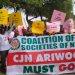 ‘You’re partisan’ — group stages protest, asks CJN to resign over comment on Integrity Group