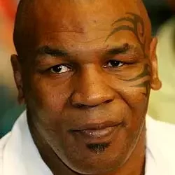 Mike Tyson falls off skateboard (Video)