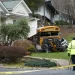 School bus packed with children crashes into house