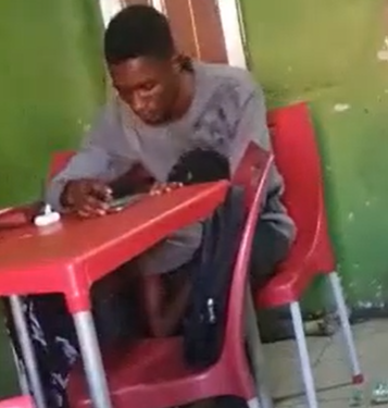 Lady spotted performing ‘oral s3x’ on her man inside a canteen in broad day light in UNILAG (video)