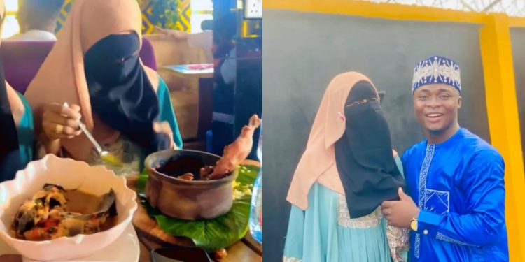 Islamic cleric shows how his niqabi wife eats in public without removing her face covering