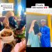 Islamic cleric shows how his niqabi wife eats in public without removing her face covering