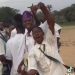 Secondary school student celebrates getting a new car with his mates
