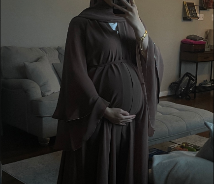 Muslim woman called out for posting her pregnant belly online while her husband is shamed for letting her