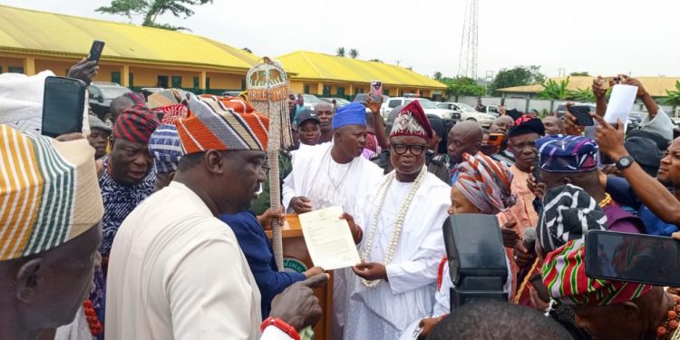 Abiodun presents Staff of Office to Sogaolu as Olu of Orile Imo
