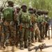 Nigerian military arrests personnel aiding terrorism in north east .