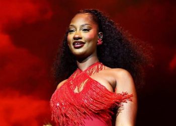 Tems stuns in bikini for 30th birthday getaway in Marbella, Spain