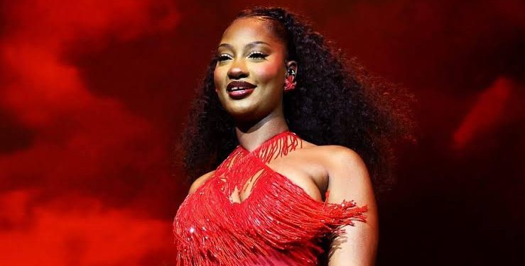 Tems stuns in bikini for 30th birthday getaway in Marbella, Spain