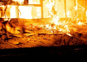 Man dies after setting himself, his partner and toddler ablaze 