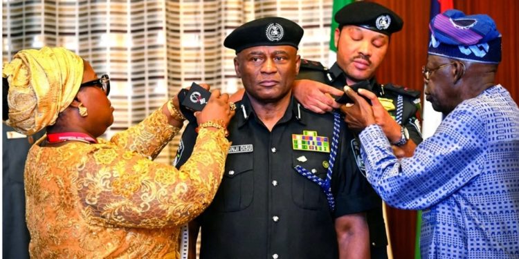 Tinubu swears in Disu as IGP, inaugurates RMAFC, FCSC Commissioners